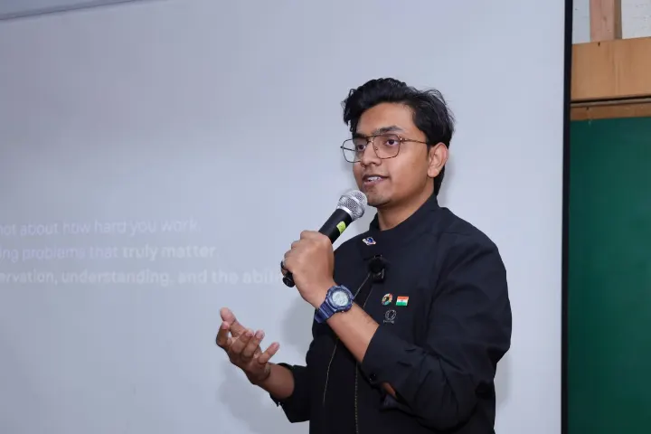 Mohammed Kabeer speaking with a microphone